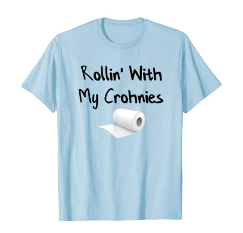 Crohn's t-shirt "Rollin' With My Crohnies" and a roll of toilet paper.