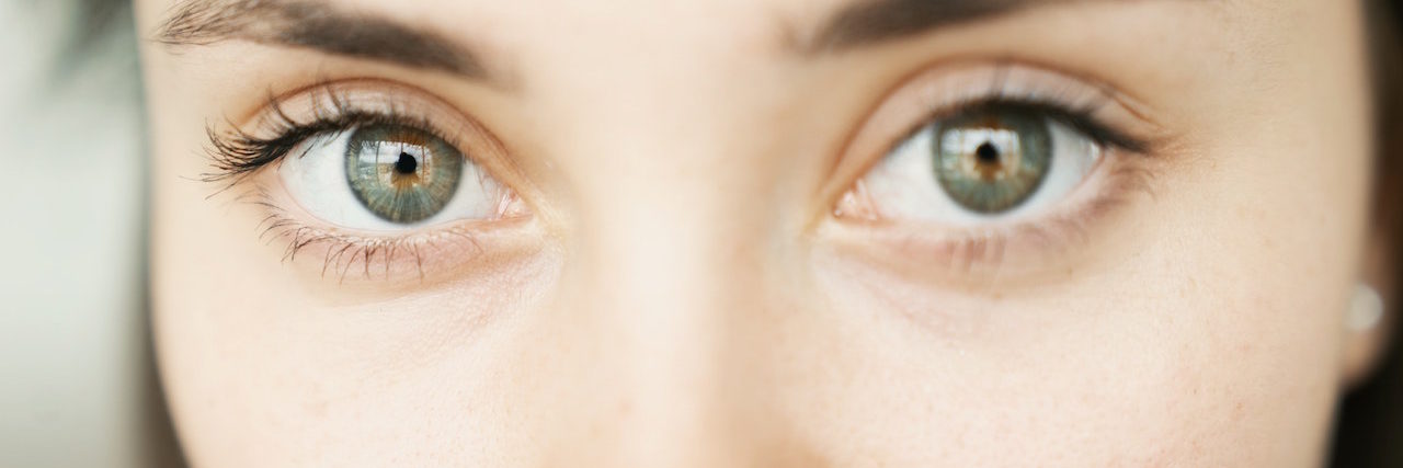 A close up of a woman's eyes