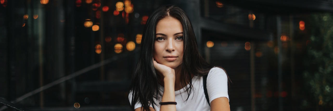 Surviving and Thriving With Schizophrenia Young woman looking confidently at camera