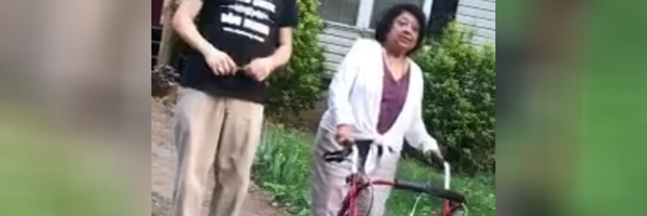 What Being Raised by a Mother With a Disability Taught Me Priya's mother using her walker.