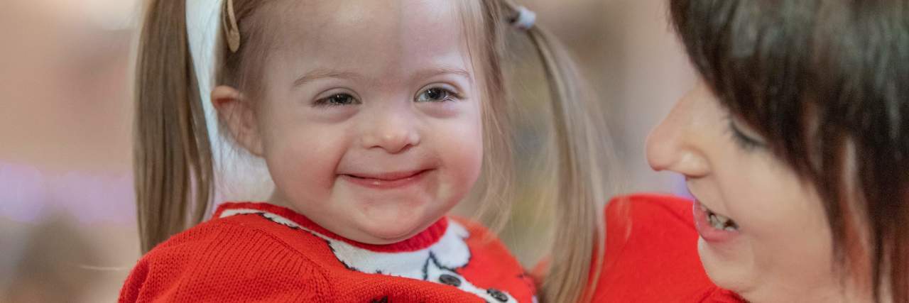 How Twitter Is Enabling Online Abuse of People With Down Syndrome Betsy, a little girl with Down syndrome