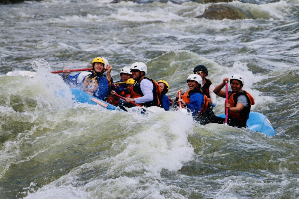 photo of contributor and her family white water rafting