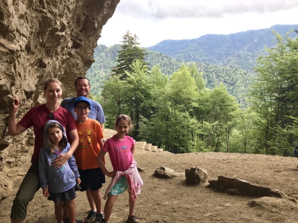 photo of contributor and her family posed while mountain climbing