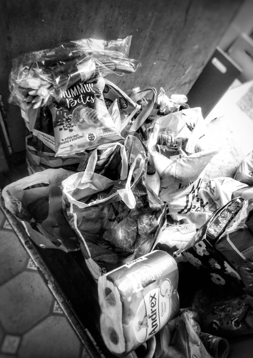 Bags of food and supplies left by friends.