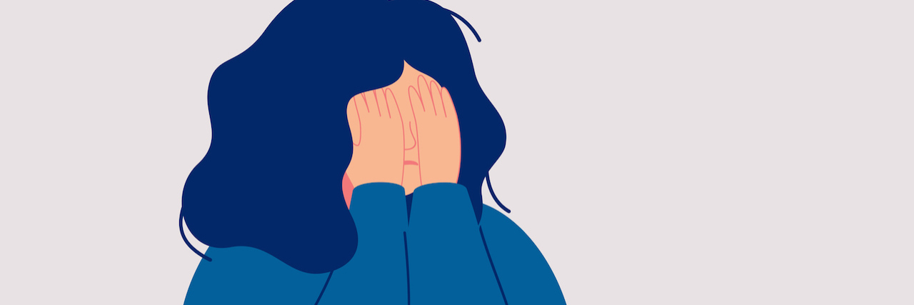 30 Thoughts of an Anxious Person During a Zoom Call A woman covering her face with her hands in front of a computer