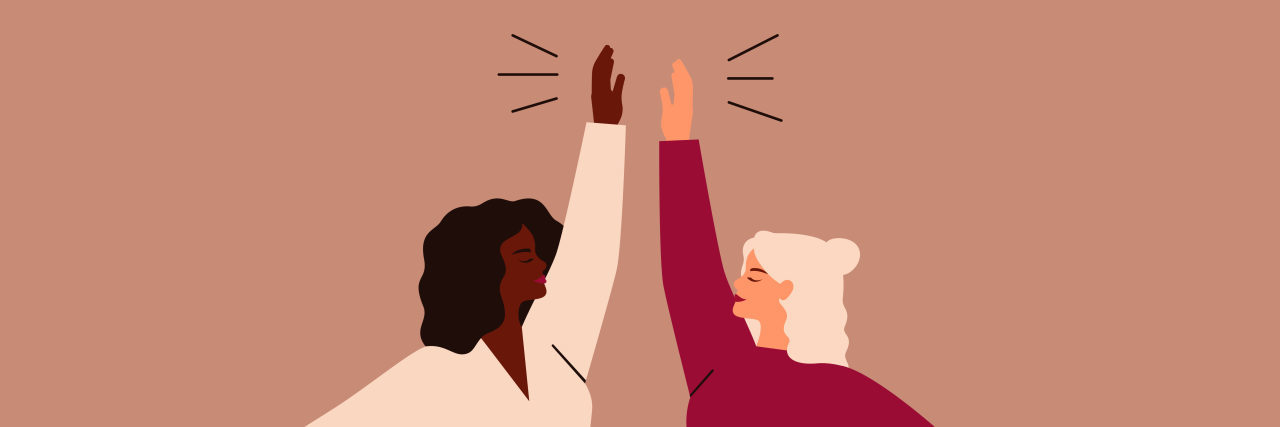 Sharing Your Feelings About Lupus With Family and Friends Two women high-five each other.