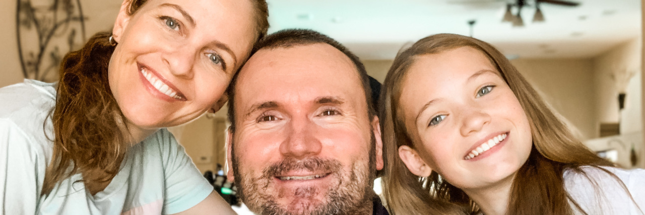 How My Husband's Spinal Cord Injury Helped Prepare Us for COVID-19 Kristen with her husband and daughter.