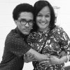 A black and white photo of Matthew Rushin with his arms around his mom, Lavern