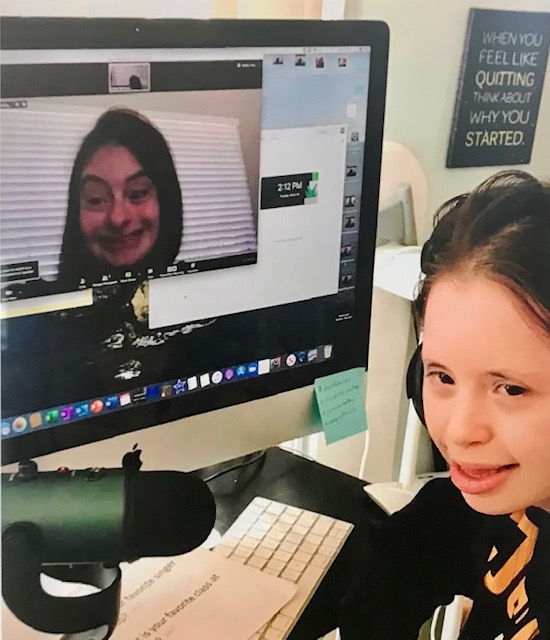 Yassy video chatting with her friend Sarah.