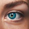 Close up shot of a woman's blue eye