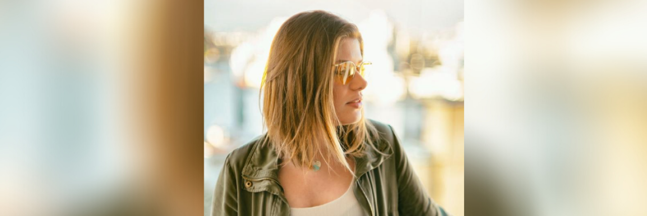 How DBT Therapy With Diary Cards Helps My Mental Health Woman wearing glasses looking toward her side