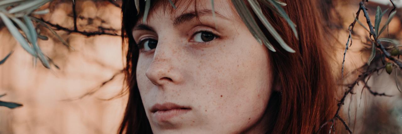 The Awful Comment a Psychiatrist Made About My Mental Health photo of woman looking angry into camera