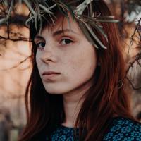 photo of woman looking angry into camera