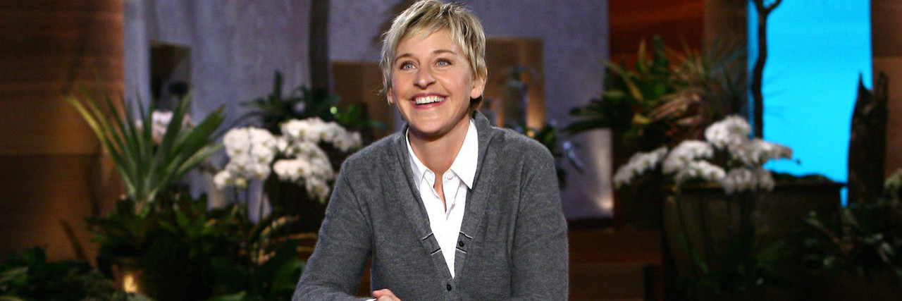 Letter to Hollywood About Ellen Show Toxic Culture Claims Ellen Degeneres sitting on the stage of her show