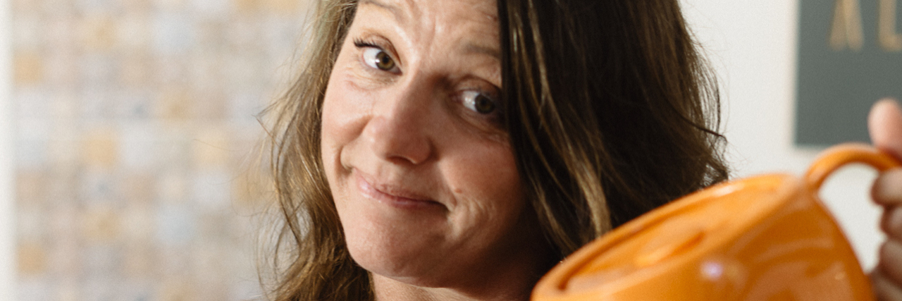 Recovering Alcoholic: Learning How to Make Friends Sober The author pouring tea into a cup