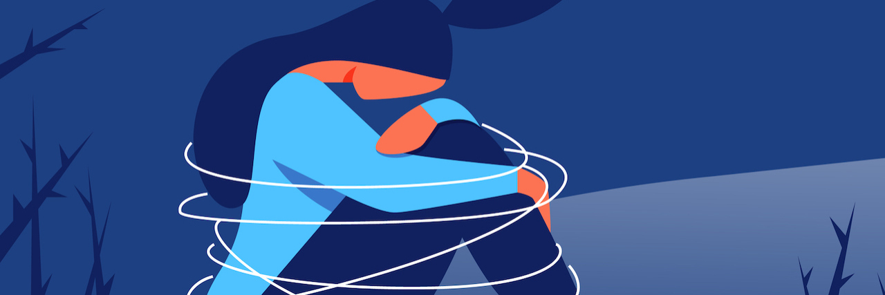 3 Ways You Can ‘See’ Someone Has Experienced Trauma Depressed Woman Sits with Arms Wrapped Around Knees