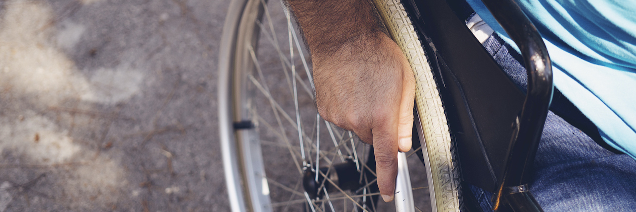 12 Ways Disabled People Experience Internalized Ableism A man in a wheelchair