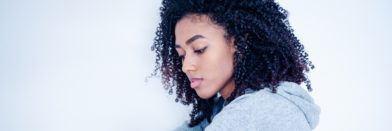 Therapist's Advice When a Teenager 'Threatens' Suicide Depressed black young girl isolated on white background