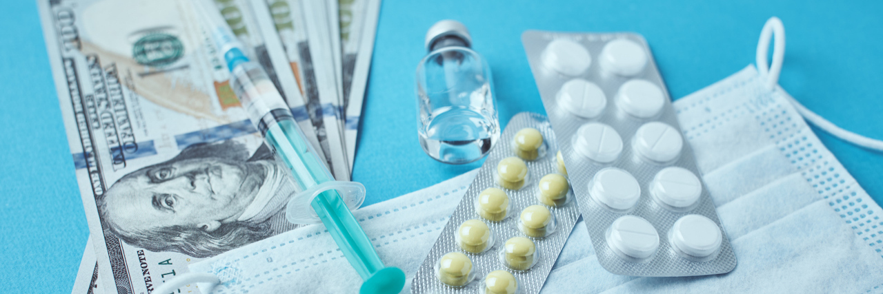 Study: Chronically Ill Women More Likely to Skip Meds Due to Cost protective mask, medical items and dollar bills on blue background