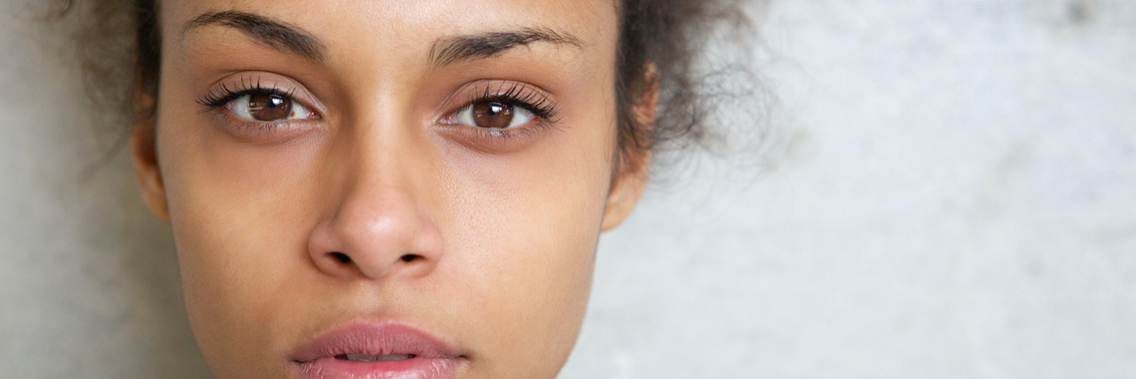 BPD and My Abandonment Issues Make Me Feel Like A Burden Close up portrait of woman of color