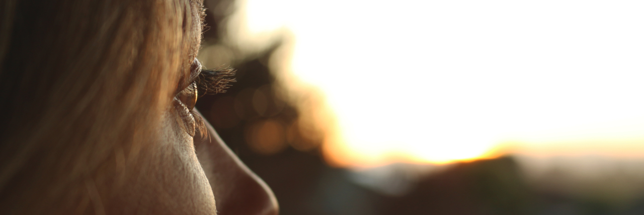 Don't Judge People With Mental Health Disabilities Young woman looking outside