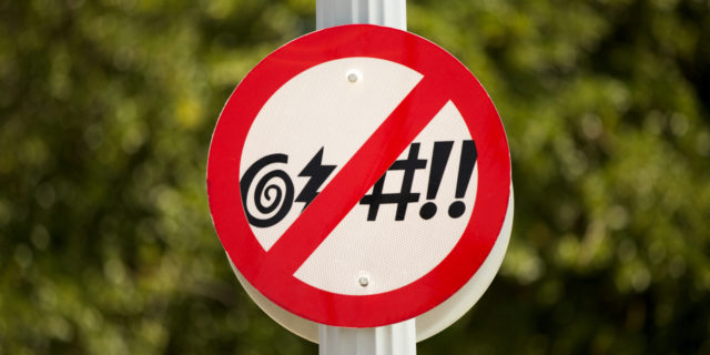 No cursing sign outdoors.