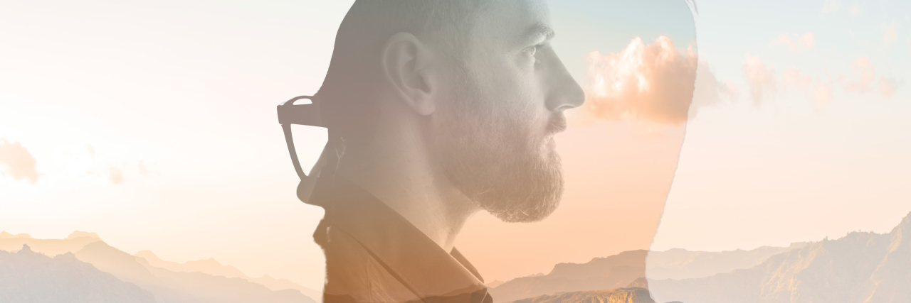 Navigating Life With Multiple Disabilities Triple exposure portrait of a man combined with beautiful mountain landscape