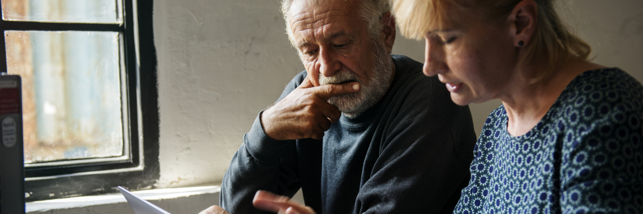 Bipolar Disorder Makes Me Struggle With Making Decisions photo of older couple making a decision on something with a laptop