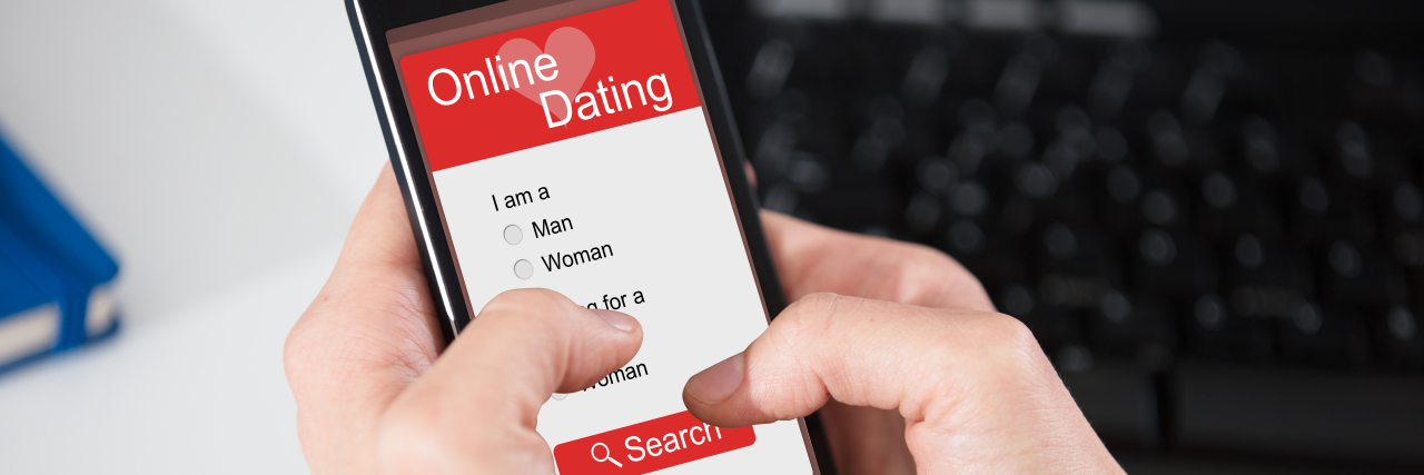 Person Browsing Online Dating Website On Smart Phone