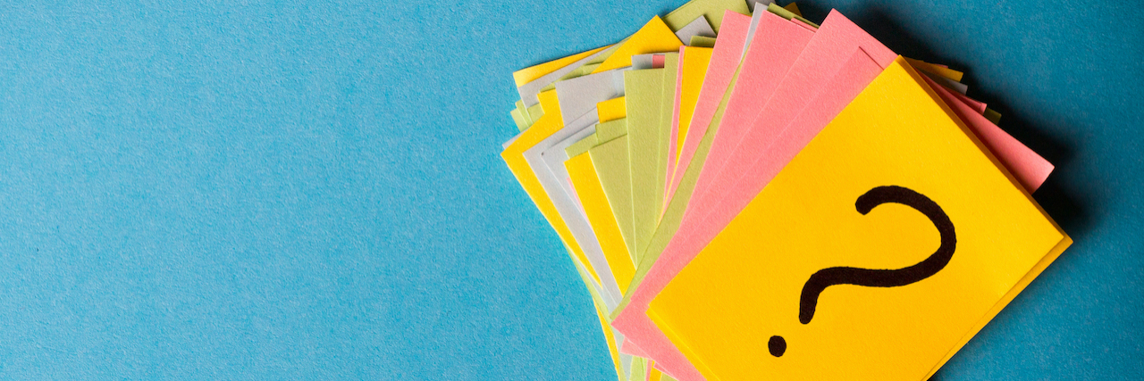 How Increasing Tolerance for Uncertainty Can Help With Your Anxiety A pile of post-it notes with a question mark on the top one