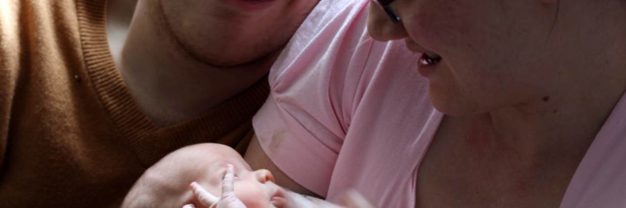 10 Tips for Disabled and Interabled Couples Considering Having Kids Michael, Alizabeth and their baby.