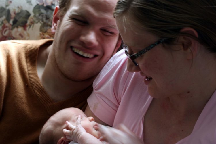 Michael, Alizabeth and their baby.