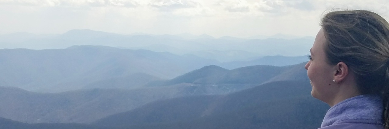 Fighting for a POTS Diagnosis in College Laurie looking at the mountains