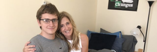 Kathy with Ryan in his college dorm room.