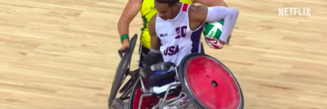 Wheelchair using basketball player