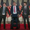 Madison Cawthorn standing up from his wheelchair at the RNC