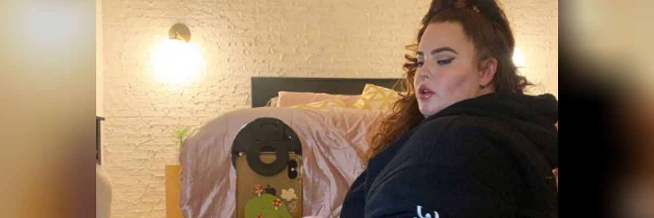 Tess Holliday Was Right About Abusive Relationships and Responsibility Tess Holliday takes a mirror selfie
