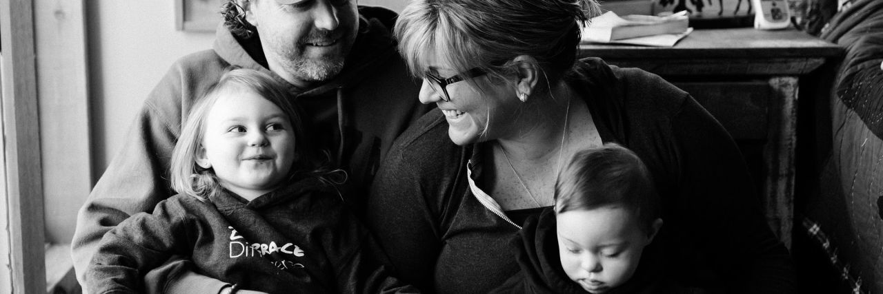 Responding to Mean 'Jokes' as Parents of a Child With Down Syndrome Sarah with her husband and children.