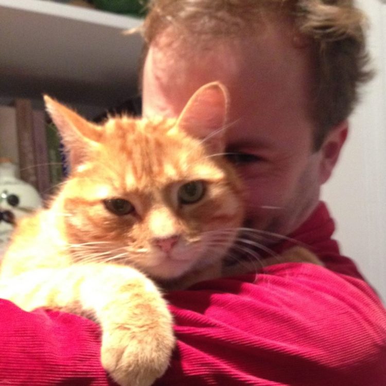 Contributor with his orange cat