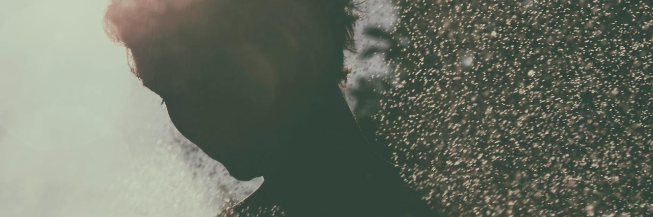 The Difference Between 'Covert Incest' and 'Incest' silhouetted photo of person's face in profile against harsh light and prayed particles of liquid like water