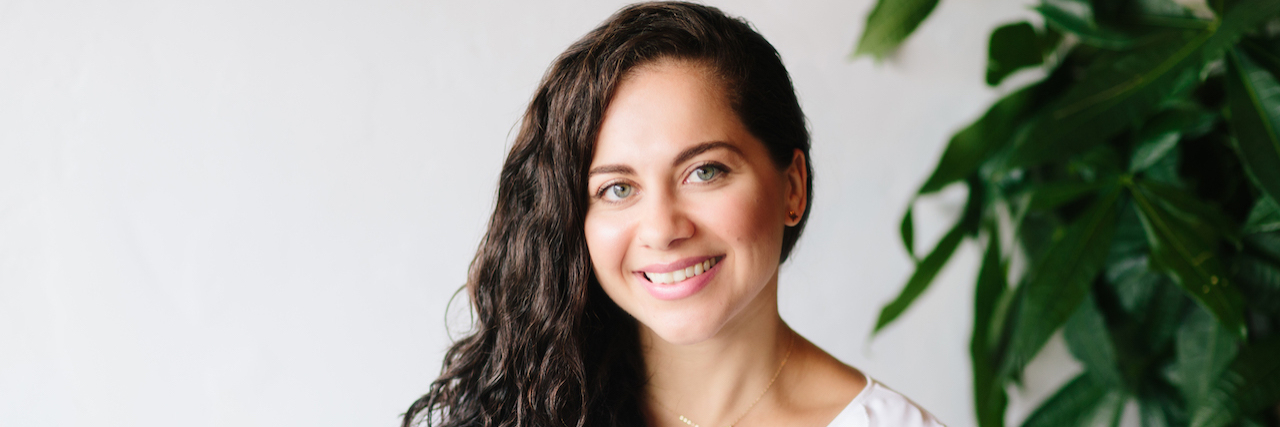 Coping With Global Uncertainty, Unrest and Trauma Image of contributor smiling at the camera