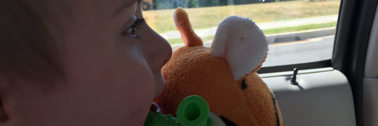 Making Choices About School for Kids With Disabilities During COVID-19 Gail's son holding his Tigger toy.