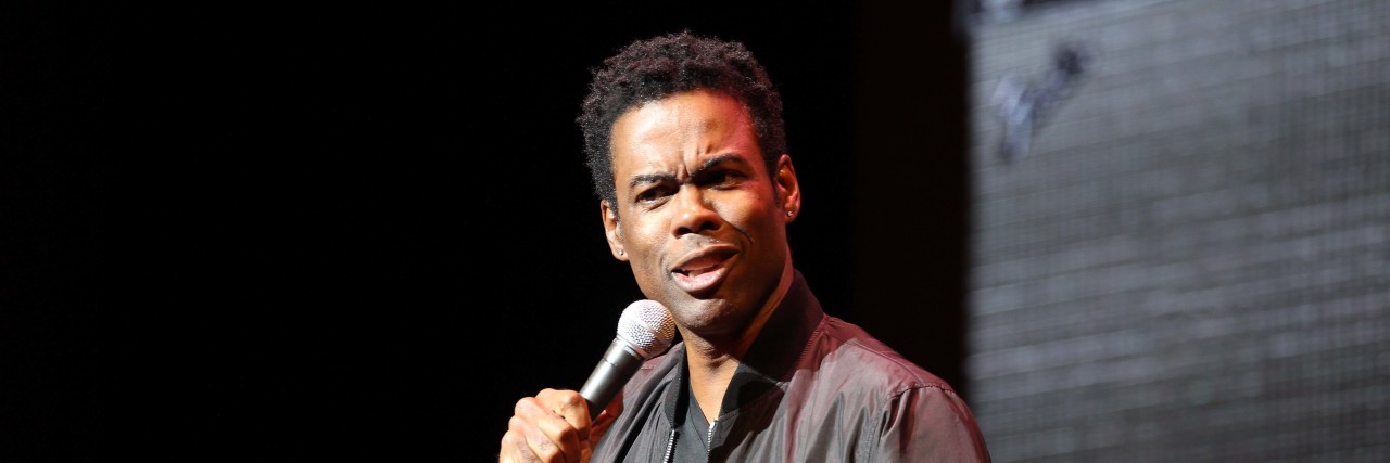 Chris Rock onstage at the Orpheum Theatre