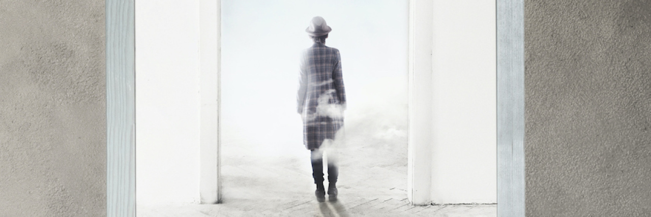 A Message to Grievers: Never Apologize for Wanting to Heal A woman walking towards a doorway showing outside