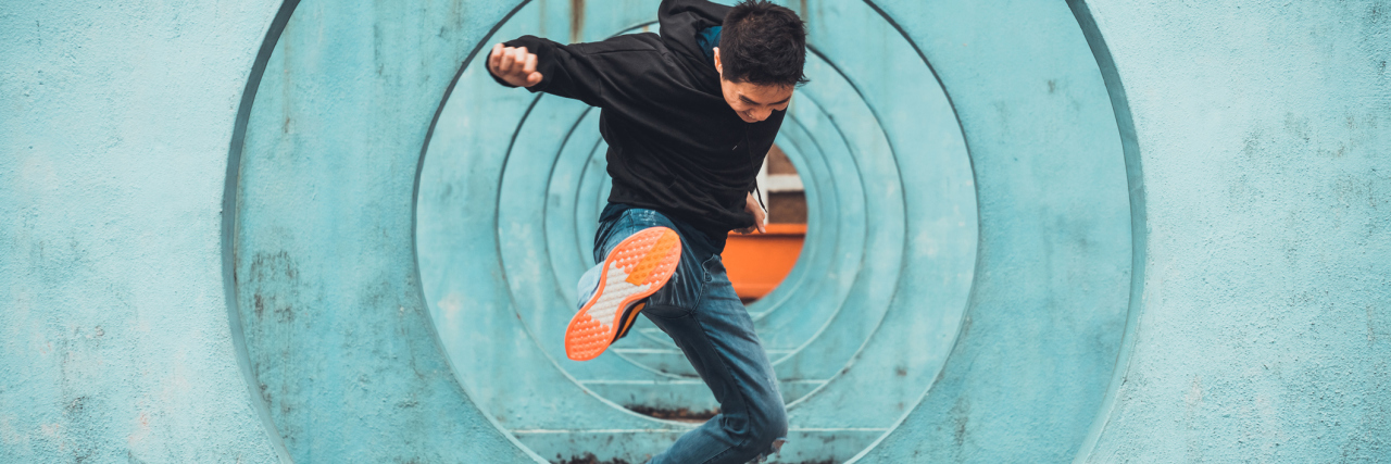 Meditation Practice for Fight-or-Flight Mode When You're Anxious active man in action of jumping and kicking