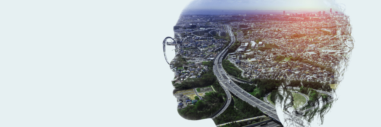 How My Adult ADHD Has Been a Learning Opportunity Silhouette of woman with cityscape inside.