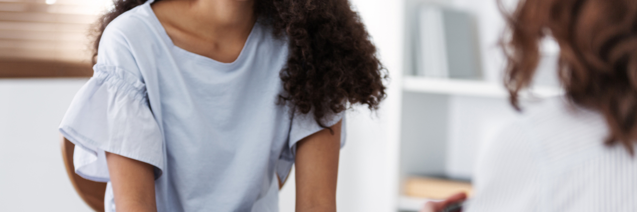 What a Therapist Wants You to Know About Trauma Therapy Anonymous photo of two women during group psychotherapy for people with depression