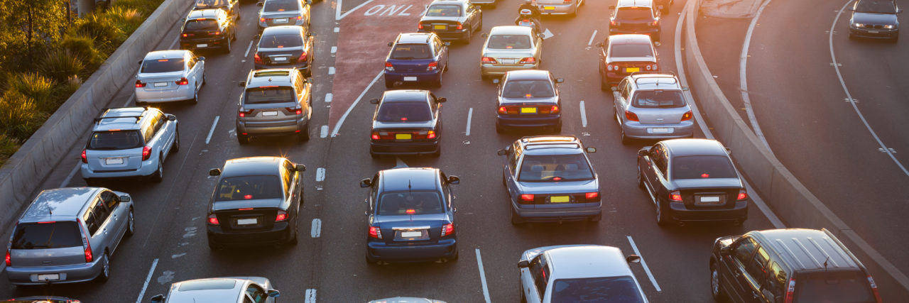 How Nonverbal Learning Disability Affects My Driving Cars stuck in traffic at an intersection.