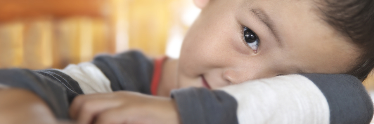 8 Common Mistakes Parents of Introverted Children Make Shy Asian boy smiling.