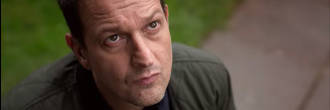 Josh Charles in Netflix's "Away" looking up at the sky